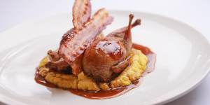 Sage-stuffed quail with bacon and jus.