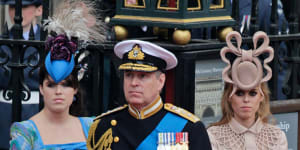 Prince Andrew and his daughters Princess Eugenie,left,and Princess Beatrice.