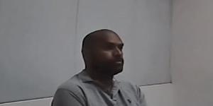 An image of Sikeli Lala being interviewed by police. 