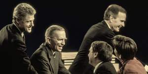 Magnate Ross Perot (centre),as a presidential candidate,with Democratic candidate Bill Clinton (left) and incumbent president George H. W. Bush (right) in a TV debate in 1992. 