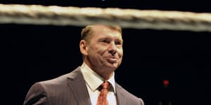 WWE chairman and CEO Vince McMahon speaks to an audience during a WWE fan appreciation event in 2010.