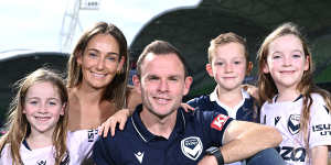 Leigh Broxham surrounded by his wife Sam and kids Billie,Sonny and Mila during his retirement announcement at AAMI Park.