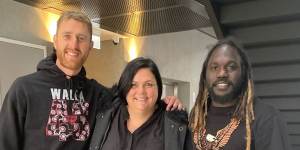 Anthony McDonald-Tipungwuti (right) on the day of his retirement announcement with Dyson Heppell and Bobbie Lee Blay (centre).