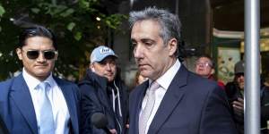 Michael Cohen leaves his apartment building on his way to Manhattan criminal court earlier this month.