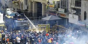 Sri Lankan president to resign after protesters stormed his home in day of violent clashes