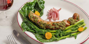 Sicilian sausage with pickled onions and charred rapini.