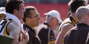 David Rath (centre) in his days as an assistant coach with Hawthorn.