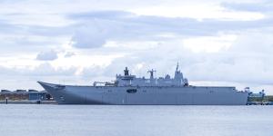 HMAS Adelaide in Brisbane before travelling to Tonga to assist in relief efforts. 