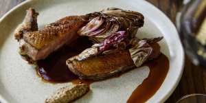 Dry-aged duck with blood plum sauce,mustard and radicchio.