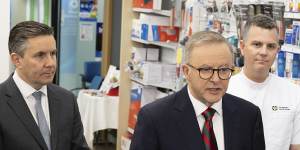 Butler (left) with Anthony Albanese at a pharmacy in September.