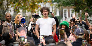 Oscar,the winning contestant in a Harry Styles lookalike competition in London. 