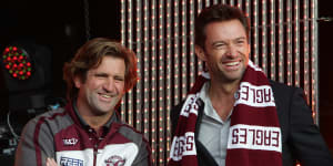 Sea Eagles fan Hugh Jackman talks to Manly coach Des Hasler in 2011.