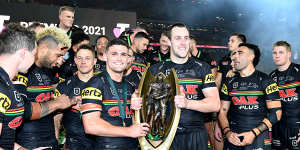 Nathan Cleary and Isaah Yeo with the premiership trophy.