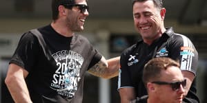 Michael Ennis and Shane Flanagan after the Sharks’ 2016 premiership win.