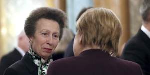 On the job ... Princess Anne talking with German Chancellor Angela Merkel.