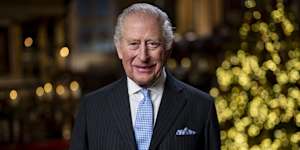 King Charles III poses during the recording of his Christmas message in the Lady Chapel of Westminster Abbey.