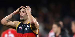 Izak Rankine reacts to Adelaide’s loss to Sydney,in which a potentially match-winning goal was ruled a point.