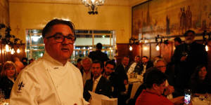 Chef-restaurateur Guy Grossi addresses invited guests at a dinner in Grossi Florentino's Mural Room to celebrate the restaurant's 90th anniversary.