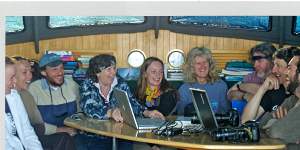 Trish with researchers on board Moon Dancer during the 2003 whale research expedition. 