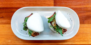 Bao bun with pork,Davidson plum and kimchi. 