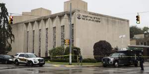 Police stand guard outside the Tree of Life Synagogue in Pittsburgh where a shooter opened fire.