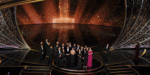 The cast and crew of Parasite accept the award for best picture at this year's Oscars.