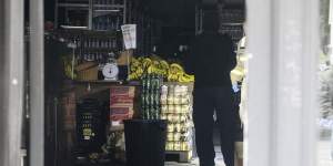 The inside of Sonsa Market after a suspicious fire overnight damaged the front part of the store.