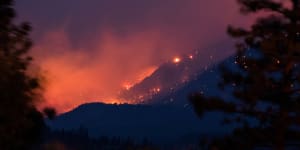 A wildfire near Lytton in Canada’s British Columbia in early July. The town recorded 49.6 degrees in late June,smashing the nation’s previous record temperature by a shocking five degrees.