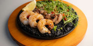 Sweetbread and prawn paella,the rice turned pitch-black with squid ink. 