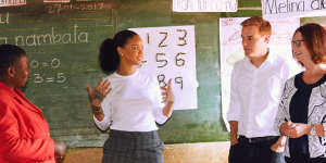 Julia Gillard in a Malawi classroom with Rihanna and Global Citizen's Hugh Evans.