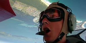 Sky high ... riding in the open-air cockpit of the Lilly Warra with pilot Chris Clark.