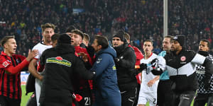 European soccer wrap:Frankfurt captain sees red for coach hit,Lyon bus stoned