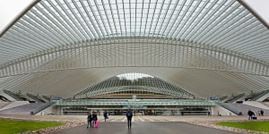 Arrive by train if you can – Guillemins station is a visually stunning,free-flowing architectural marvel.