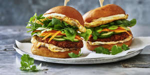 Banh mi-inspired chicken burgers with soft fried eggs,pâté and pickles.