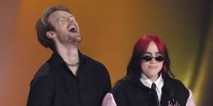 Finneas,left,and Billie Eilish accept the award for song of the year for What Was I Made For?.