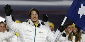 Flagbearer Alex Pullin leads the Australian team during the opening ceremony of the 2014 Winter Olympics in Sochi,Russia.