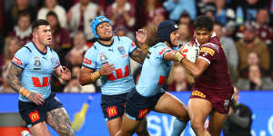 Selwyn Cobbo is tackled by Jarome Luai in the State of Origin decider.