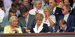 Katharine,Duchess of Kent,sits alongside Diana,Princess of Wales,and Prince William in the Royal Box at Wimbledon in July 1994.