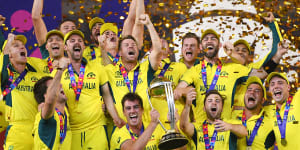 Australia celebrate a remarkable victory over India in the World Cup final in November.