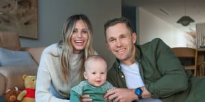 Brit and Joel Selwood with their baby son,Joey.