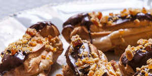 A simple choux pastry has been shaped into eclairs and dressed up with espresso cream and praline.