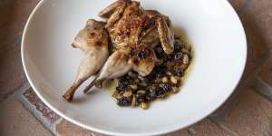 Chargrilled quail with sweet and sour sauce.