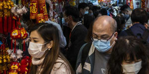 Shoppers prepare to celebrate Lunar New Year in Hong Kong,China,amid ongoing “COVID-zero” restrictions.