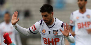 Perth Glory's Bruno Fornaroli stands over Sydney FC's Kosta Barbarouses in their clash at Netstrata Jubilee Stadium on March 14 - one of the final matches of the A-League before COVID-19 forced it into recess.