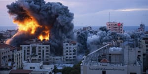 Fire and smoke rises following an Israeli airstrike,in Gaza City.