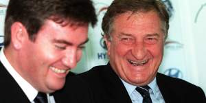 Talk of the town:Eddie McGuire and John Elliott spruik the rivalry at a Carlton-Collingwood press conference in the early 2000s.