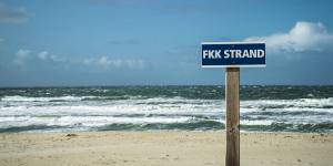 An FKK sign denotes this beach as one for those who enjoy “free body culture”.