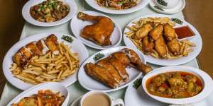 Chips,spaghetti,rice and noodles all share space on the menu of a typical Hong Kong-style cafe,like Kowloon Cafe.