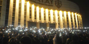 On January 4,protesters light their smartphones as they gathered in the centre of Almaty,Kazakhstan.