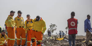 Investigators comb through the wreckage of the Ethiopian Airlines Boeing 737 MAX jet that crashed shortly after takeoff on March 10. 